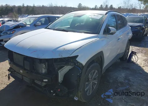 2022 Hyundai Tucson Hybrid Blue z USA, uszkodzony, nr VIN KM8JBCA13NU041032